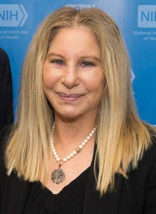 Barbra Streisand, seen here in 2018 at a National Institutes of Health seminar, is now 83 and has released her third album of duets with a cast of musical legends.
