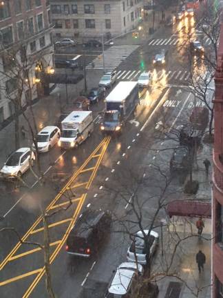 This truck with its headlights on, heading southbound on West End Avenue below 86th Street at about 7:30 a.m. on March 13, appears to be in violation of traffic laws banning commercial vehicles from the&#xa0;length of the residential avenue between 59th Street and 107th Street. Photo: Courtesy of West End Preservation Society