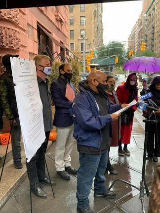 Mayoral candidate Shaun Donovan (next to sign) with neighborhood volunteers at the Lucerne on Sunday, November 1. Photo: UWS Open Hearts Initiative on Twitter