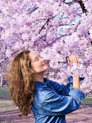 Our Heather Stein, the writer, in Central Park taking in the beauty &amp; serenity of the blossoms