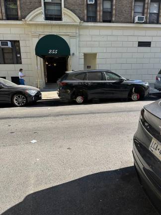 Another victim of tire theft at 88th and West End Avenue.