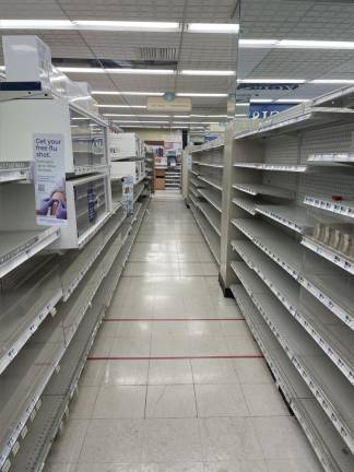 Most shelves are already empty in the Rite Aid, which is scheduled to close on the last day of the month. Photo: Abigail Gruskin
