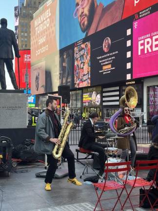 Subway performers Lucky Chops played a rousing set of pop covers at the press conference announcing the new campaign. <b>Photo: Kay Bontempo.</b>