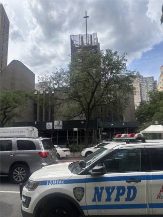 A police cruiser was parked outside the Epiphany Roman Catholic Church on Second Avenue and 22nd Street on the afternoon of Aug. 29 but, at least when our reporter checked, there was no police officer inside or nearby.