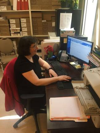 Deborah Lechner working at her desk at Park East. Photo: Michael Rock