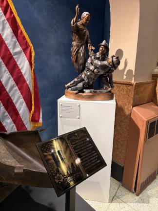 The new 9/11 Memorial at St. Francis of Assisi includes retired FDNY firefighter Dennis Burke’s sculpture “Brotherhood 9/11.”