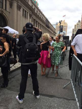 Fashion Week adorns the sidewalks of West 33rd Street.