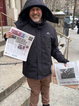 City council member Gale Brewer plans hold a press conference on the corner of W. 79th St. and Broadway on Jan. 25 at 10 a.m. in a show of support for newsstand operator Sadik Topia (above) seen here holding a copy of the Jan. 18th West Side Spirit where his eviction by the city from the newsstand he operated for 23 years was front page news. Photo: Michael Oreskes