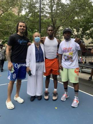 Andrew Blacks (far right) and Gale Brewer (second from left), with Cole Anthony of the Orlando Magic (far left) and Joe Toussaint (second from right) of the Iowa Hawkeyes. Photo courtesy of Andrew Blacks