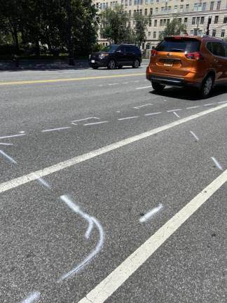 Street markings north of 77th Street.
