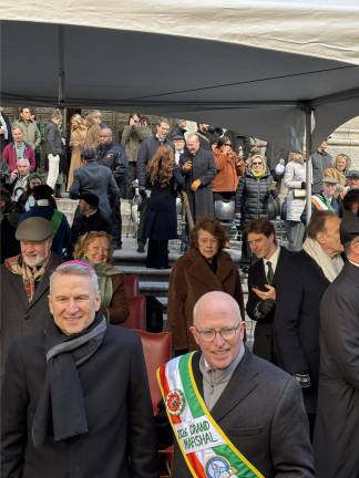 Archbishop Ronald Hicks greets the press with Grand Marshall Bob McCann at the foot of St. Patrick’s Cathedral on March 17, 2026.