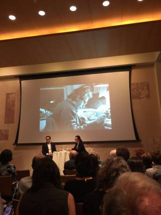 New York Times reporters Michael S. Schmidt and Maggie Haberman in front of a photo of Jack Newfield at the Roosevelt House Public Policy Institute at Hunter College on June 14. Photo: Jon Friedman