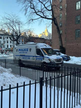 A NYPD crime scene van is parked in the First Ave. Loop Rd in Stuyvestant Town outside 300 First Ave at 18th St. Police are investigating a report of an unidentified male making verbal threats to a 14-year-old girl.