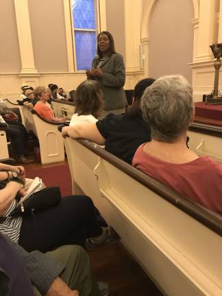 Public Advocate Letitia (Tish) James campaigns for state attorney general last week at a candidate's forum in the New York New Church in Murray Hill. Photo: Douglas Feiden