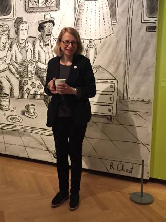 Roz Chast in front of her mural &quot;Subway Sofa&quot; (2016) at a morning preview of &quot;Cartoon Memoirs&quot; on April 13. Photo: Val Castronovo
