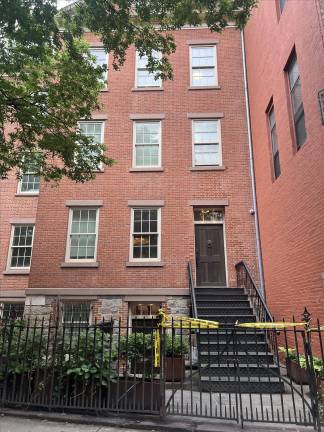 The townhouse on Prince St. where the kidnapping is said to have occurred, pictured not long after Woeltz’s arrest.