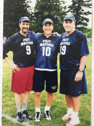 Stephan Russo (9) with Dave White (10) and Dom Starsia (19). The three played together at Brown in the early 70s and now at Lake Placid. Photo courtesy of Stephan Russo.