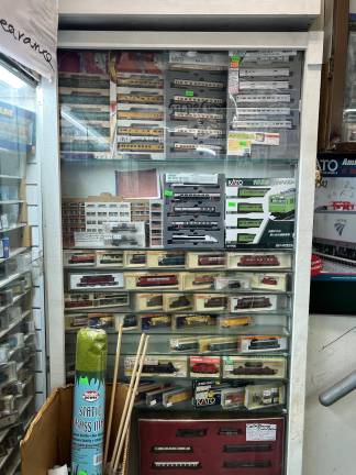 The Red Caboose features model trains in all sizes. This is part of the N scale stock on display, perfect for railroad empires in tiny Manhattan spaces.