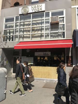 The site of the old Caf&#xe9; &#xc9;clair at 141 West 72nd Street for 54 years is now home to Izakaya Ida, a popular Japanese gastropub, and Naam Yoga, a second-floor yoga studio. Photo: Douglas Feiden