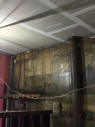 The mural was found behind a wall that was knocked down. Photo: Silas White