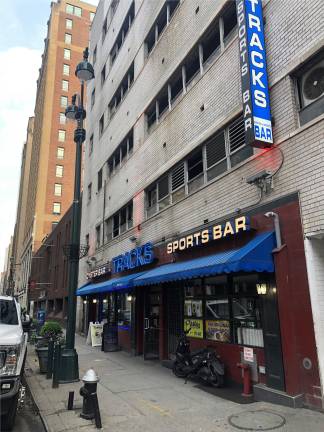Tracks Sports Bar on West 31st Street could be easily seen during the press conference held by Transportation Secretary Sean Duffy and Amtrak executive Andy Byford. It apparently has at least a temporary reprieve sparing it from destruction while the Trump administration searches for a master developer.