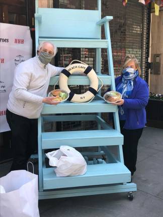 Assembly Member Rebecca Seawright and David Goodkind of Beach Cafe donating and delivering food to health care workers.