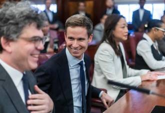 Erik Bottcher (center) at the swearing-in ceremony of Julie Menin as speaker of the City Council on Jan. 8. He was given the Democratic line in the special election for the West Side New York State Senate seat recently vacated when Brad Hoylman-Sigal became borough president.