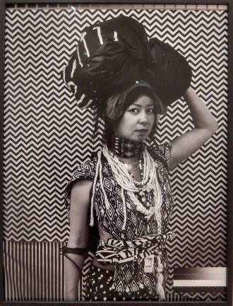 Stephanie Syjuco is among 17 artists whose work comprises &quot;Being: New Photography 2018,&quot; the Museum of Modern Art's photography biennial. Syjuco's &quot;Cargo Cults: Head Bundle&quot; adds challenging social commentary to familiar poses and techniques. Photo: Adel Gorgy