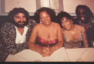 Bobby Ochs (left) wearing the jacket a reviewer called “absolutely hideous.” With (left to right) his wife Carolyn and Ashford and Simpson. Photo courtesy of Bobby Ochs