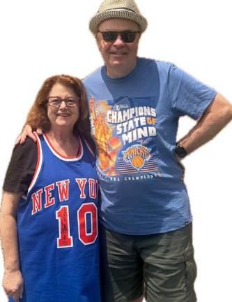 They met while working at Fairchild Publications when the two die-hard New York Knicks fans decided to split a season ticket mini-plan. Romance blossomed, leading to marriage and two kids. The writer broke out her prized Walt Frazier autographed jersey to celebrate this year’s NBA championship.