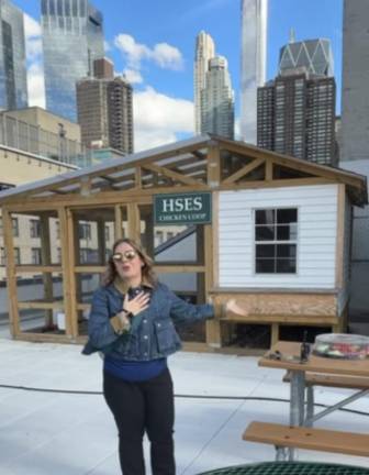Principal Heather DeFlorio outside the HSES chicken coop.