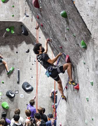 Conrad Booker rock climbing at a competition in Rock Club in Rochelle. Photo: Curtesy of Conrad Booker