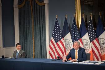 Mayor Bill de Blasio with Schools Chancellor Richard Carranza (left) at City Hall on July 8, at an announcement about preliminary school reopening plans.