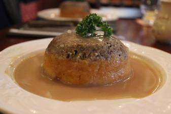 A plate of haggis, neeps, and tatties all served on top of each other. It may sound unsavory, but the mixture of a sheep’s lung stuffed with chopped organ meat, oatmeal, and fats is a treasured delicacy in its native Scotland. A version may soon be available here.