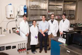 Dan Esposito (center) with a previous group of Columbia University students — who have since graduated — in his lab. Photo courtesy of Dan Esposito
