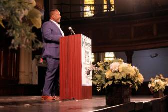 Community activists, celebrities and political leaders who are trying to spare historic West Park Presbyterian Church from the wreckers ball, rally inside the building on June 10. Photo: Beau Matic