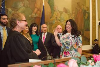 Sabrina Kraus (far right) who grew up on the Upper East Side, is sworn in as NYS Supreme Court Justice by Judge Judith Gische, marking first in-person ceremony since COVID-19 curtailed such events nearly three years ago. Photo: Rachel Marks/Orah Photo