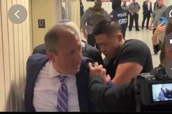 NYC Comptroller as he is handcuffed by ICE agents at 26 Federal Plaza in downtown Manhattan June 17. Homeland security later claimed he was