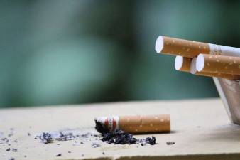 THE REAL COST OF SMOKING IN NEW YORK STATE