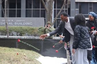 Flowers placed on monument during Black History Month at African National Burial Ground, Feb. 21, 2026.