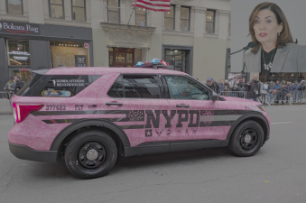 Camouflage pink NYPD vehicle at Veterans Day Parade, Nov. 11, 2025. Inset top right: Governor Hochul.
