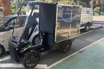 A driver of an Amazon e-van delivery vehicle similar to the one above deliberately drove the vehicle into a pedestrian who had admonished him. Prosecutors said the driver was charged with two counts of assault for the incident at E. 55th St. and First Ave.