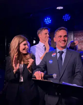 Carl Wilson (center, front) has officially won the District 3 City Council race with 60 percent of ranked-choice votes, according to updated BOE tallies. He was endorsed by Council Speaker Julie Menin (left) and State Senator Erik Bottcher (back).