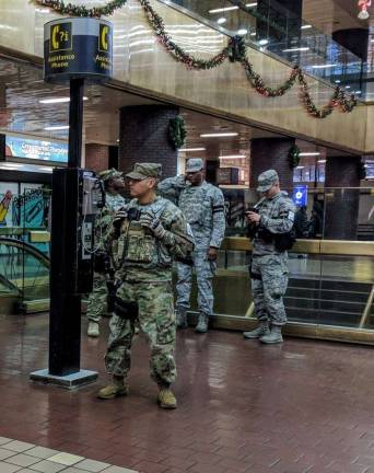 National Guard troops on the second floor of the Port Authority the day after Akayed Ullah, a 27-year-old Bangladeshi immigrant living in Brooklyn, prematurely detonated a pipe bomb in an underground passage nearby. Photo: Liz Hardaway