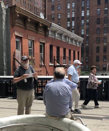 A new docent at the High Line explains about the West 23rd Street Area. Photo Credit: Frank Orwat