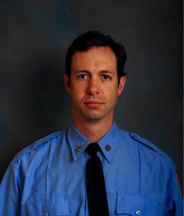 Official portrait of David Guilford. Photo courtesy of FDNY.