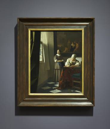 <i>Woman Writing a Letter with Her Maid</i>, ca. 1670-72, one of two highly prized loans in the Johannes Vermeer show, on loan from the National Gallery of Ireland, Dublin.Vermeer created a total of six paintings with the letter-writing theme.