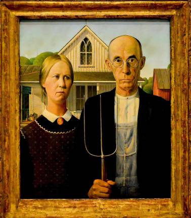 Grant Wood's iconic painting, &quot;American Gothic,&quot; is on loan from the Art Institute of Chicago and on view at the Whitney through June 10. Photo: Adel Gorgy