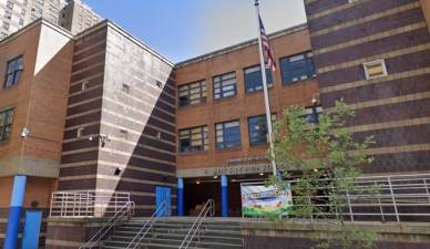 The exterior of Edward A. Reynolds West Side High School. Parents at the transfer school have joined a lawsuit seeking to preempt its “swapping” with a smaller school in East Harlem, The Young Women’s Leadership School.