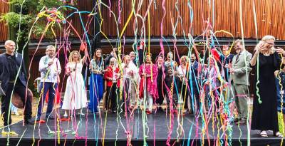 Elected officials join project leadership and the show’s stars at the ribbon-cutting ceremony of the newly renovated Delacorte Theater on July 15.